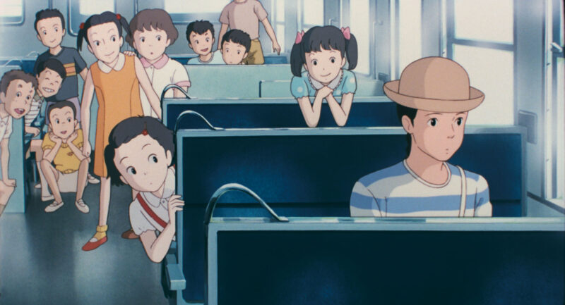 Hình bóng của những đứa trẻ mười tuổi ẩn hiện trên chuyến tàu trở về Tokyo của Taeko